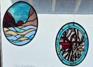 lot 23 image: Floral Stained Glass Window Medallion, pair