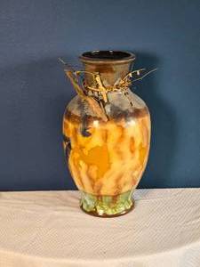 lot 105 image: Studio Pottery Vase with Drip Glaze and Twig Accent