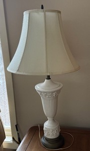 lot 23 image: White Ceramic Urn-Base Table Lamp With Floral Relief - Approx 32 In Tall