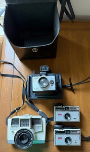 lot 52 image: Polaroid Square Shooter 2 Land Camera - Wollensak 60mm Lens, Kodak Instamatic 154 (Lot of 4)