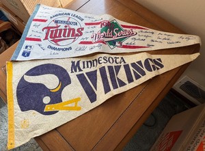 lot 123 image: Minnesota Twins World Series Champions Pennant & Minnesota Vikings Pennant