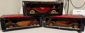 lot 211 image: Givenchy Xeryus Wooden Car Collectible (Lot of 3) - Vintage Boxed Display Cars