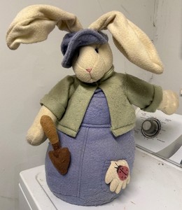 lot 222 image: Handmade Fabric Bunny Plush - Green Jacket, Purple Dress, Shovel Accessory - 18 Inches Tall