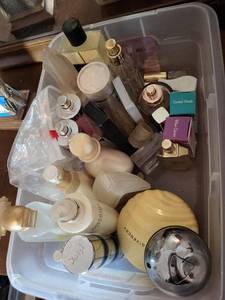 lot 167 image: Assorted Perfume Bottles Collection - YSL, Givenchy, Lancme in Plastic Bin