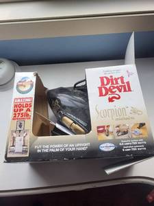 lot 170 image: Dirt Devil Scorpion Hand Vacuum & SteamFast Garment Steamer
