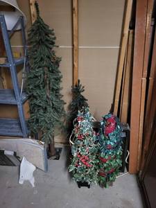 lot 199 image: Two Artificial Christmas Trees - Two Holiday Garlands with Red Berries