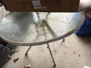 lot 266 image: Round Outdoor Glass Patio Table with Metal Frame