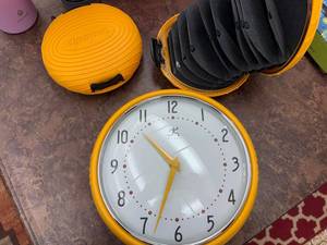 lot 282 image: Infinity Wall Clock & Discgear CD Holder - Vibrant Yellow