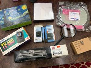 lot 284 image: Mixed Lot Casio TV, Translators, Punch, Magnifying Glass, Puzzle, Clock Globe