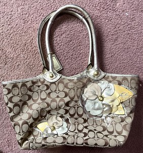 lot 3 image: Coach Signature Tote Bag - Floral Appliqus on Brown Coated Canvas MV1073-F16276