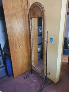 lot 78 image: Arched Wicker Floor Mirror - Wrought Iron Scroll Stand