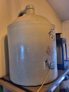 lot 161 image: Stoneware Jug Cream Glaze with Wing Motif & Blue Oval Stamp - Vintage Ceramic Decor