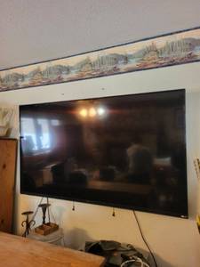 lot 190 image: VIZIO Flat-Screen TV - Wall-Mounted Living Room Display