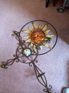 lot 72 image: Sun Face Metal Wall Art - Circular Frame with Sun Rays & Scrollwork