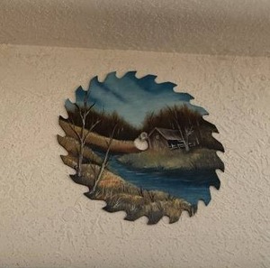 lot 217 image: Decorative Circular Saw Blade Wall Art - Mountain Landscape