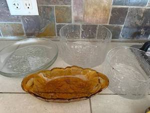 lot 322 image: Amber Glass Serving Dish, Clear Embossed Bowls and Two Plates - 5Piece Set