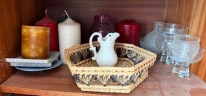 lot 254 image: shelf inside Hutch - White Porcelain Mini-Pitcher in Woven Basket with Glass Goblets & Candles