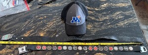 lot 268 image: dining area, under table - Harley-Davidson Belt wBuckle, Seat Belt belt & Minnesota baseball Cap (New Era 9FORTY Hat)