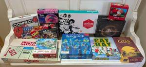 lot 211 image: MR - Board Games Lot - Monopoly, Labyrinth, Pay Day, Rivals for Catan, Suspicion, UNO, Connect 4