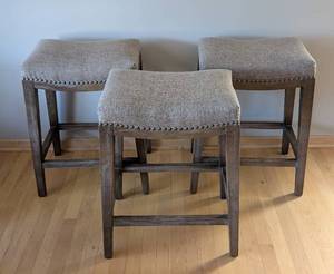 lot 8 image: ML - Three Counter Height Stools - Gray Upholstery With Nailhead Trim