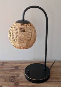 lot 108 image: ML - Table Lamp - Arc Black Metal Base with Woven Wicker Shade