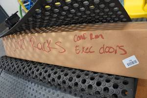 lot 738 image: Coat Racks and Rubber Mats