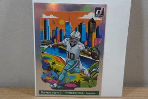 lot 18 image: 2024 Donruss Tyreek Hill Downtown Box Topper Football Card