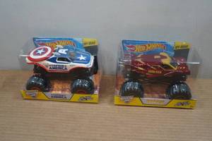 lot 106 image: Hot Wheels 124 Scale Monster Jam Trucks - Captain America & Ironman