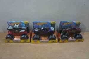 lot 108 image: Hot Wheels 124 Scale Monster Jam Trucks - Bone Shaker, Cleatus, Barbarian