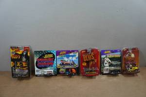lot 155 image: 6 Johnny Lightning - Kiss, True Grit, Wacky Winners, Elvis, Evel Kenevel, Dukes of Hazard