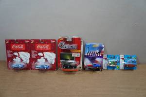 lot 157 image: Johnny Lightning Coca-Cola, Area 51, 4th of July & Maisto Fresh Metal