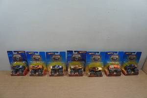 lot 170 image: 7 Hot Wheels Monster Jam Trucks - Early - Blue Thunder, Monster Mutt, DK