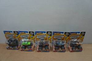 lot 175 image: 5 Hot Wheels Monster Jam Trucks - Tattoo Series