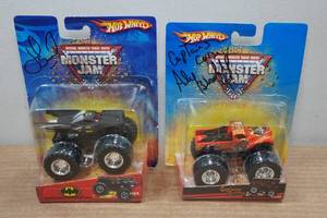 lot 178 image: 2 Signed Hot Wheels Monster Jam Trucks - Captains Curse, Batman