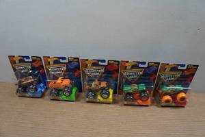 lot 179 image: 5 Hot Wheels Monster Jam Trucks - with Stunt Ramps