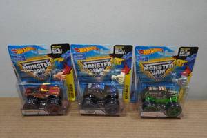 lot 188 image: 3 Hot Wheels Monster Jam Trucks - Track Ace Tires