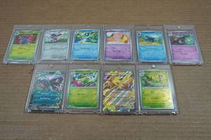 lot 237 image: 10 Pokemon Trading Cards in Acrylic Cases