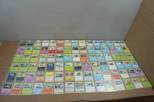 lot 240 image: 10 Pages of Pokemon Trading Cards