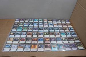 lot 244 image: 8 Pages of Magic the Gathering Trading Cards