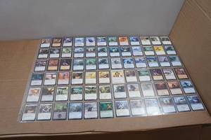 lot 245 image: 8 Pages of Magic the Gathering Trading Cards