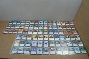 lot 246 image: 9 Pages of Magic the Gathering Trading Cards