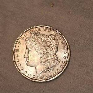 lot 17 image: 1885 Morgan Dollar $1 AU