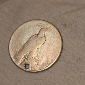 lot 18 image: 1925 Peace Dollar $1