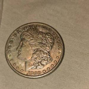 lot 34 image: 1880 S Morgan Dollar $1, AU plus