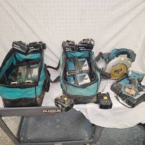lot 38 image: Makita 28V Cordless Kit, Circular Saw, Driver Impact and B39B628 Batteries w 5 Chargers-works
