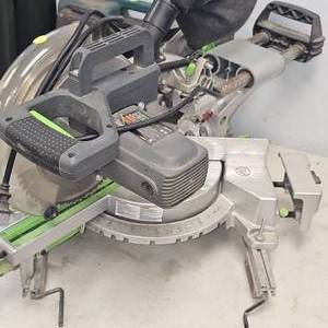 lot 39 image: Genesis Sliding Compound Saw, Runs but needs new Trigger Switch