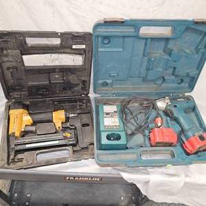 lot 40 image: Makita Impact Driver Kit, 2 Batteries, charger and Bostich Air Crown Stapler
