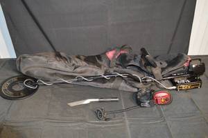 lot 82 image: Whites DFX Metal Detector Kit with Round Coil, Headphones, Digging Tool & Carry Bag