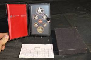 lot 85 image: Royal Canadian Mint - 1983 Canadian Dollar 9-Coin Collector Set in Display Case