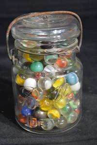 lot 93 image: Ideal Mason Jar with Multicolor Glass Marbles